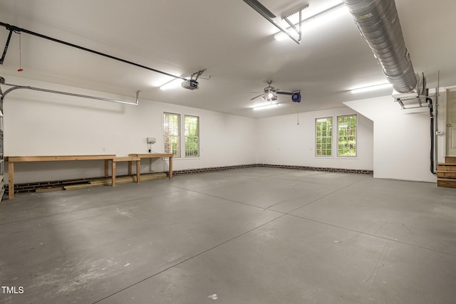 7604 Copper Creek Ct, Wake Forest, NC 27587 - garage with a garage door opener and a workshop area