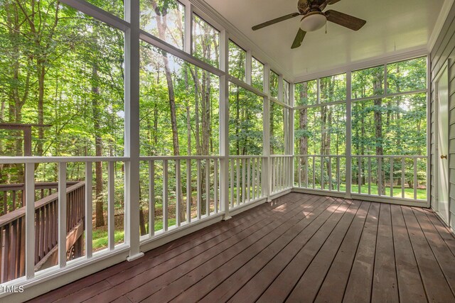 7604 Copper Creek Ct, Wake Forest, NC 27587 - unfurnished sunroom featuring ceiling fan and a view of trees