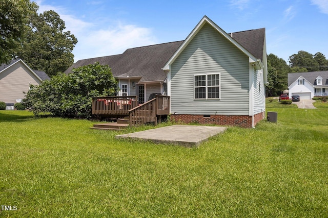 106 Oak Rd, Butner, NC 27509 - back of house with a patio area, crawl space, a wooden deck, a lawn, and a shingled roof