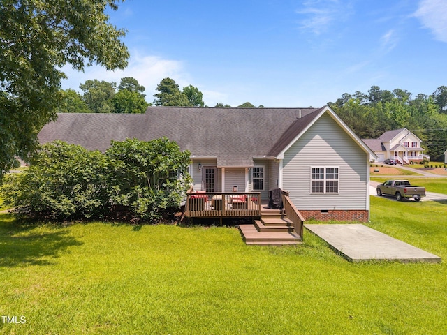 106 Oak Rd, Butner, NC 27509 - back of property featuring crawl space, a deck, a yard, a patio, and roof with shingles