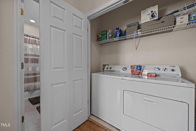 106 Oak Rd, Butner, NC 27509 - laundry room featuring separate washer and dryer