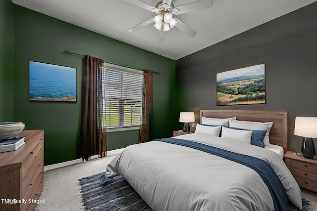 106 Oak Rd, Butner, NC 27509 - carpeted bedroom with baseboards, ceiling fan, and lofted ceiling