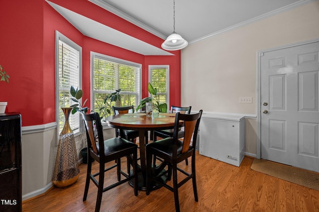 106 Oak Rd, Butner, NC 27509 - dining room featuring ornamental molding and light wood-type flooring