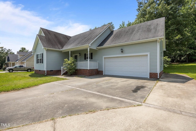 106 Oak Rd, Butner, NC 27509 - ranch-style home featuring a porch, concrete driveway, a shingled roof, and a front yard