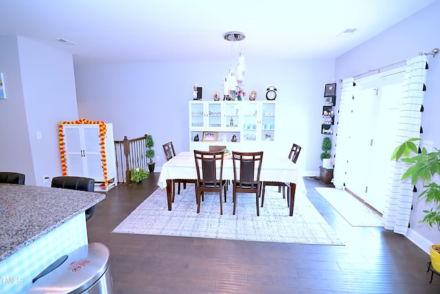 1141 Boxcar Way, Apex, NC 27502 - dining space with dark wood-style floors and baseboards