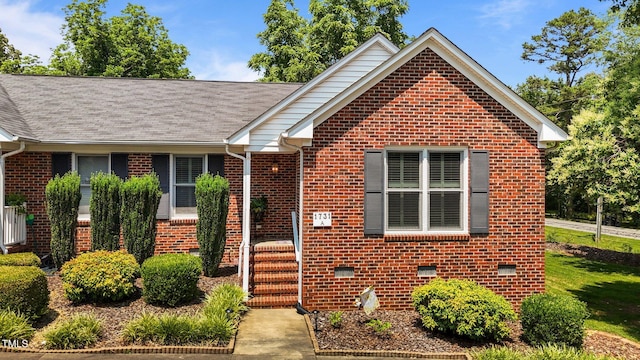 1731 Malone Rd Unit A, Burlington, NC 27215 - view of front of home featuring brick siding and roof with shingles