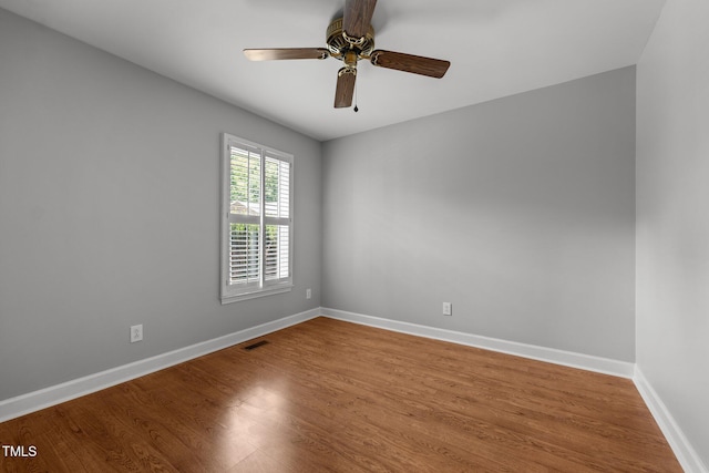 1731 Malone Rd Unit A, Burlington, NC 27215 - unfurnished room featuring wood finished floors, baseboards, and ceiling fan