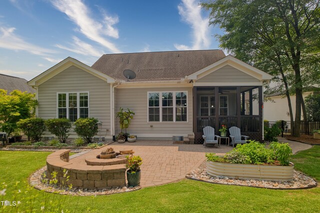 1161 Golden Star Way, Wake Forest, NC 27587 - rear view of property with an outdoor fire pit, a patio area, ceiling fan, a shingled roof, and a sunroom