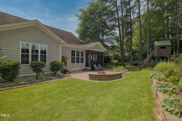 1161 Golden Star Way, Wake Forest, NC 27587 - view of yard featuring a patio, a sunroom, and an outdoor fire pit