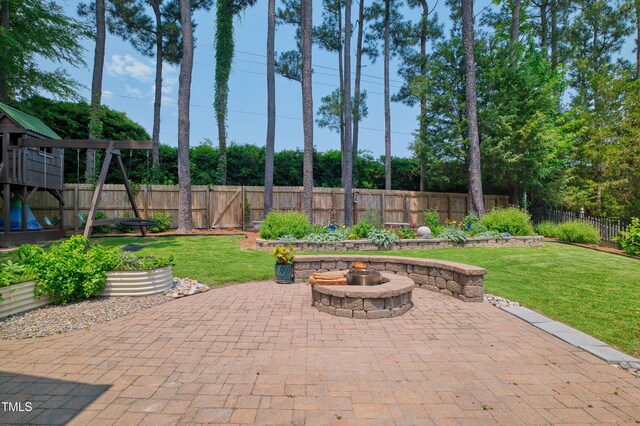 1161 Golden Star Way, Wake Forest, NC 27587 - view of patio / terrace featuring an outdoor fire pit