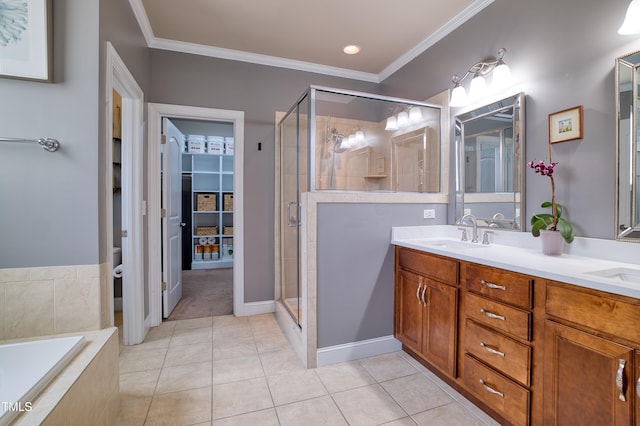 1161 Golden Star Way, Wake Forest, NC 27587 - bathroom with a stall shower, double vanity, tile patterned floors, a bath, and ornamental molding