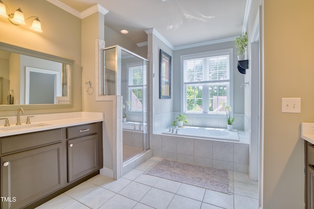 1161 Golden Star Way, Wake Forest, NC 27587 - bathroom with vanity, a garden tub, a shower stall, ornamental molding, and tile patterned flooring