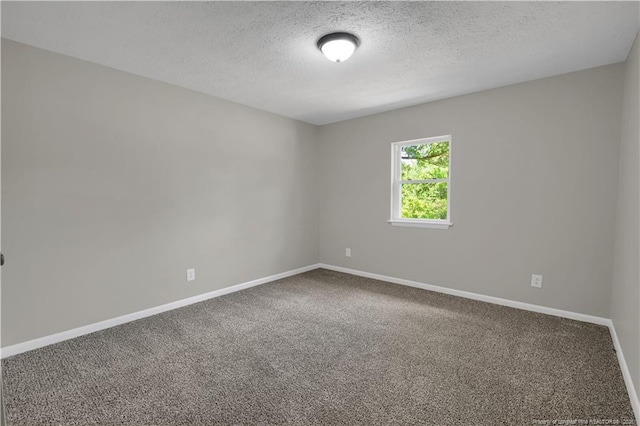 6263 Stoney Point Loop, Fayetteville, NC 28306 - carpeted empty room with a textured ceiling and baseboards