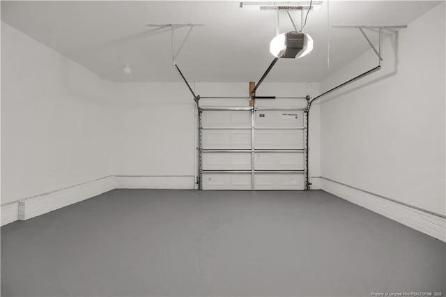6263 Stoney Point Loop, Fayetteville, NC 28306 - garage featuring a garage door opener