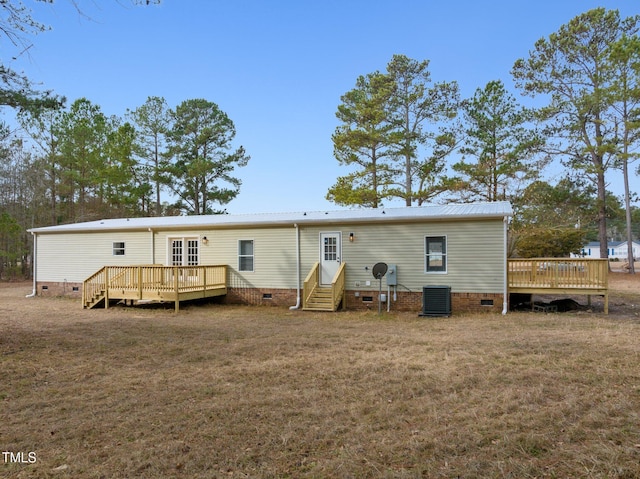 752 Dundee Cir, Raeford, NC 28376 - rear view of property featuring crawl space, a wooden deck, entry steps, and central AC unit
