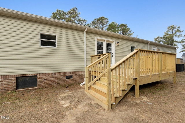 752 Dundee Cir, Raeford, NC 28376 - rear view of house with crawl space, a deck, and central AC unit