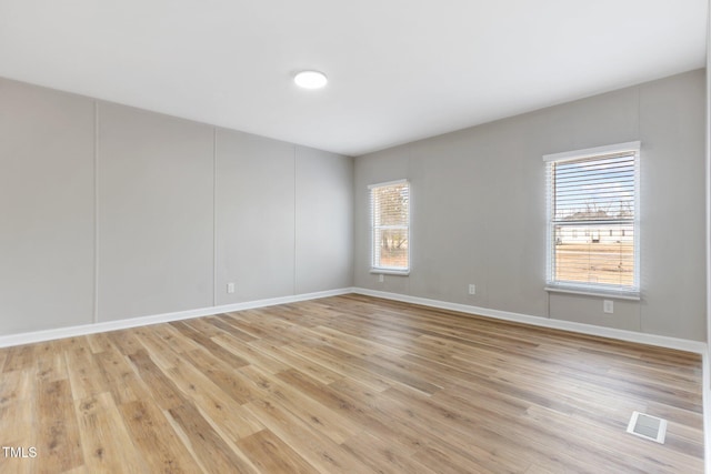 752 Dundee Cir, Raeford, NC 28376 - unfurnished room featuring light wood finished floors and baseboards