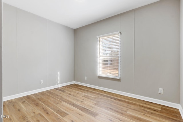 752 Dundee Cir, Raeford, NC 28376 - unfurnished room with light wood finished floors and baseboards