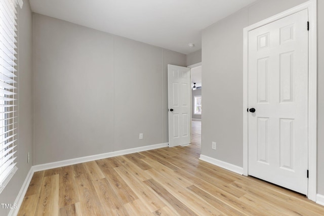 752 Dundee Cir, Raeford, NC 28376 - unfurnished bedroom featuring light wood-style floors and baseboards