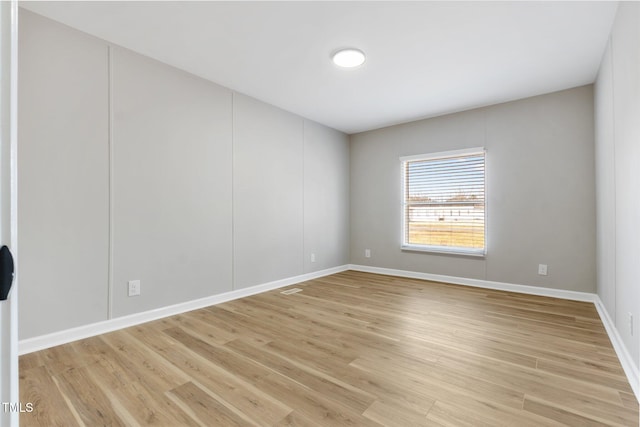 752 Dundee Cir, Raeford, NC 28376 - empty room with light wood-style floors and baseboards
