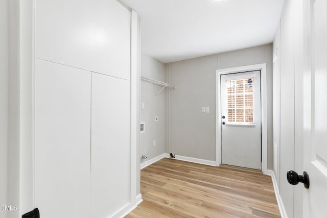 752 Dundee Cir, Raeford, NC 28376 - laundry room featuring light wood finished floors, baseboards, and washer hookup