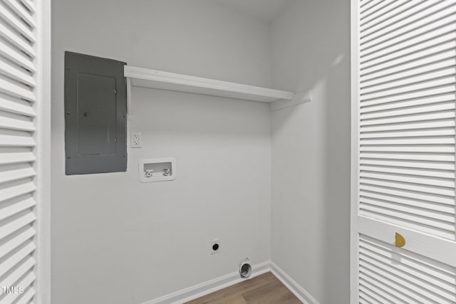 216 Burkwood Ln, Raleigh, NC 27609 - washroom with washer hookup, electric panel, wood finished floors, electric dryer hookup, and baseboards