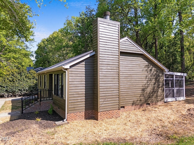 216 Burkwood Ln, Raleigh, NC 27609 - view of outdoor structure featuring a sunroom