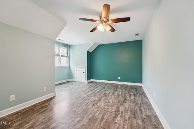 304 Cayman Ave, Holly Springs, NC 27540 - bonus room featuring ceiling fan, wood finished floors, and baseboards