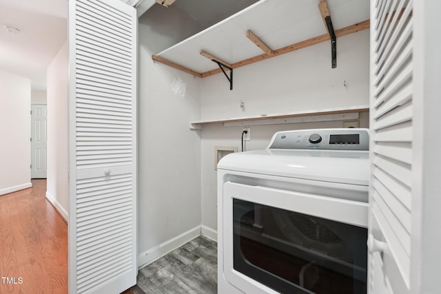 304 Cayman Ave, Holly Springs, NC 27540 - washroom featuring washer / dryer, wood finished floors, and baseboards