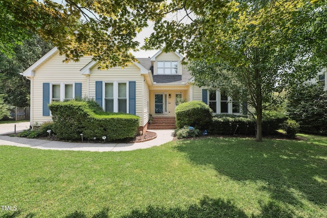 304 Cayman Ave, Holly Springs, NC 27540 - view of front of property featuring a front lawn