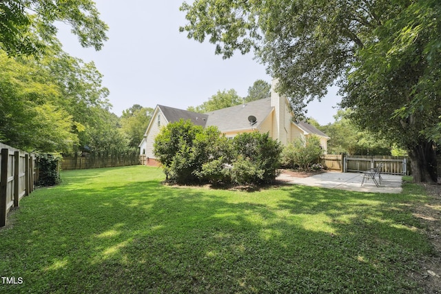 304 Cayman Ave, Holly Springs, NC 27540 - view of yard featuring a patio