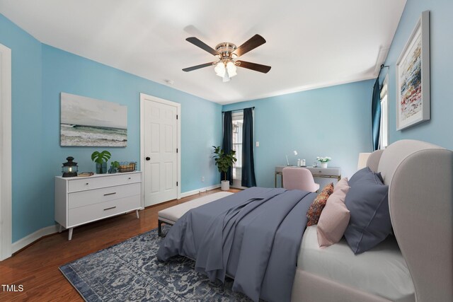 304 Cayman Ave, Holly Springs, NC 27540 - bedroom with wood finished floors, baseboards, and a ceiling fan