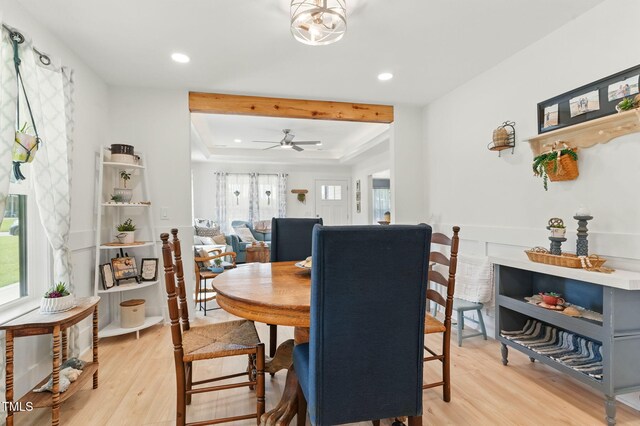 221 Moon Cir, Dunn, NC 28334 - dining room featuring light wood-style floors, a tray ceiling, ceiling fan, and recessed lighting
