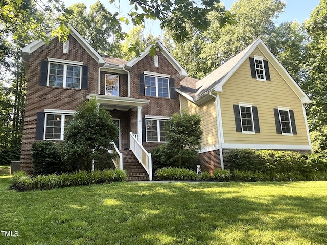 3650 Pleasants Ridge Dr, Wake Forest, NC 27587 - view of front of home with brick siding and a front lawn