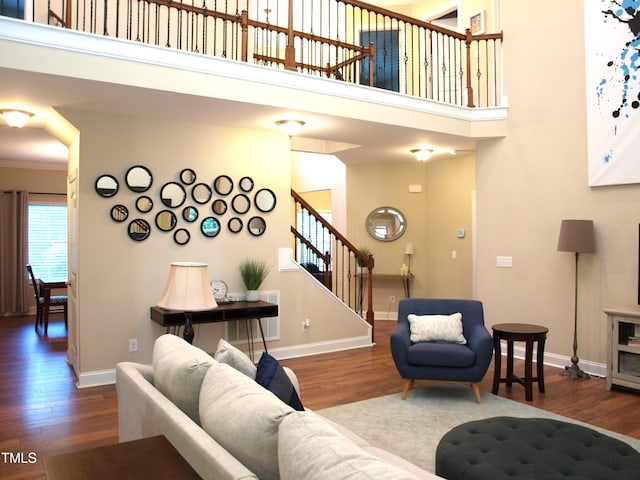3650 Pleasants Ridge Dr, Wake Forest, NC 27587 - living area featuring stairs, wood finished floors, baseboards, and a high ceiling