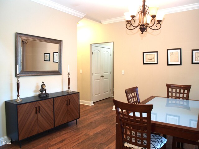 3650 Pleasants Ridge Dr, Wake Forest, NC 27587 - dining space featuring a chandelier, crown molding, dark wood-type flooring, and baseboards