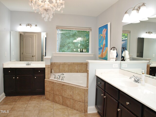 3650 Pleasants Ridge Dr, Wake Forest, NC 27587 - full bath with two vanities, a bath, tile patterned floors, and a chandelier