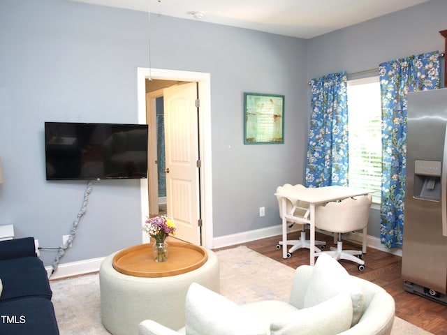 3650 Pleasants Ridge Dr, Wake Forest, NC 27587 - living room with baseboards and wood finished floors