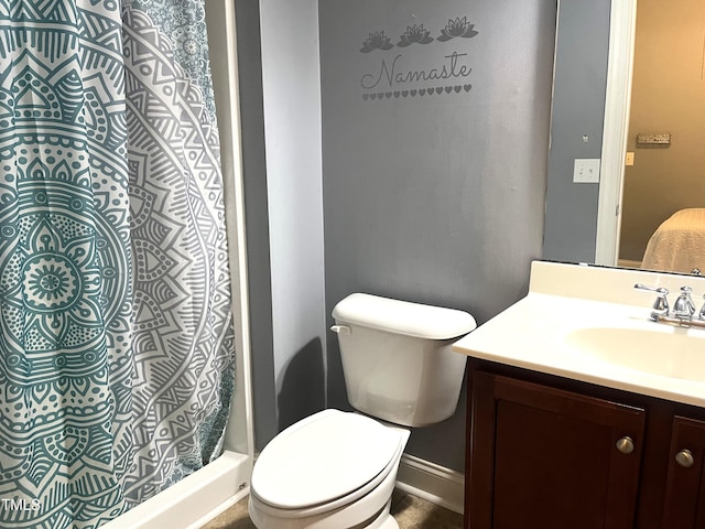 3650 Pleasants Ridge Dr, Wake Forest, NC 27587 - bathroom featuring vanity, toilet, a shower with shower curtain, and baseboards