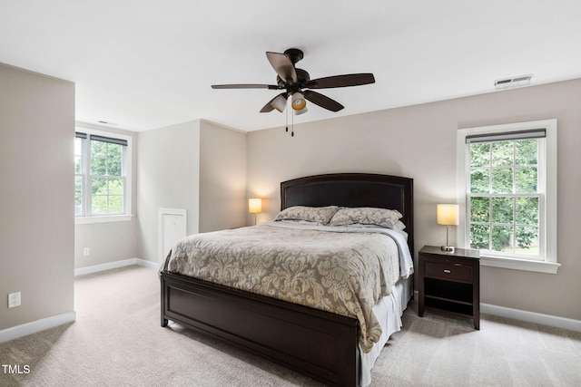 8201 Ivymount Way, Raleigh, NC 27613 - bedroom featuring carpet floors, baseboards, and ceiling fan