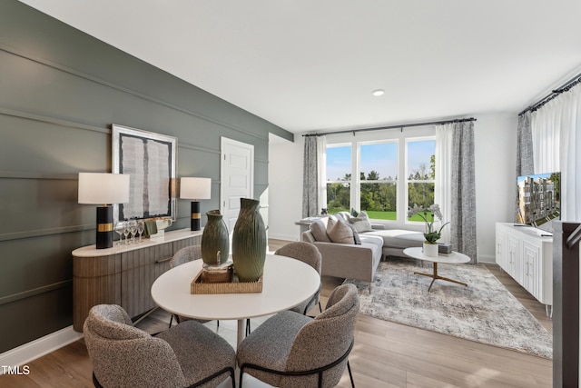 142 N White St # 100, Wake Forest, NC 27587 - dining room with wood finished floors and baseboards
