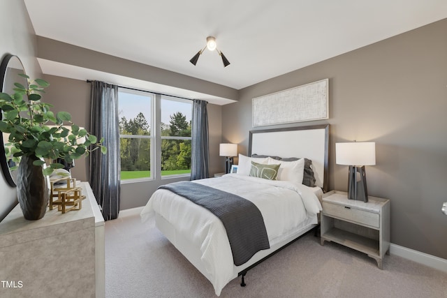 142 N White St # 100, Wake Forest, NC 27587 - bedroom with baseboards and carpet floors