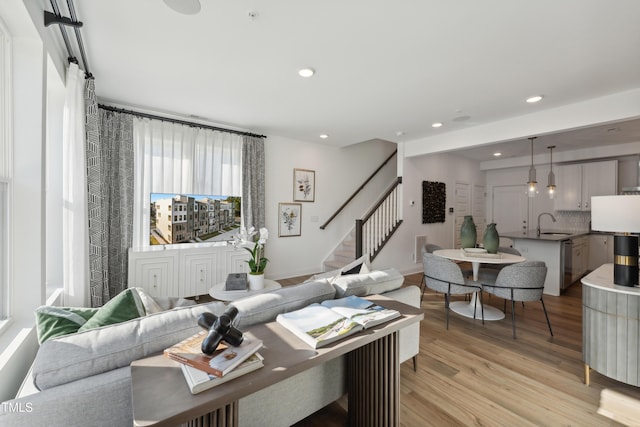 142 N White St # 100, Wake Forest, NC 27587 - living room with stairway, light wood-type flooring, and recessed lighting
