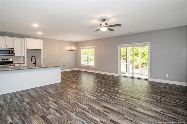 3029 Candlelight Dr, Fayetteville, NC 28311 - kitchen featuring stainless steel appliances, open floor plan, a ceiling fan, and recessed lighting