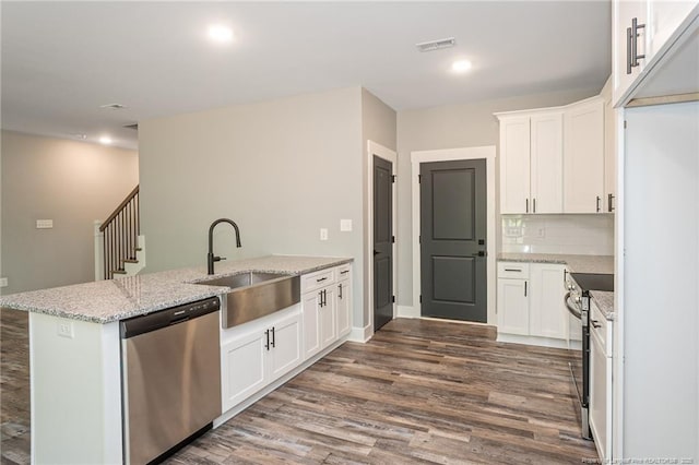 3029 Candlelight Dr, Fayetteville, NC 28311 - kitchen featuring dishwasher, a sink, dark wood-type flooring, white cabinets, and light stone countertops