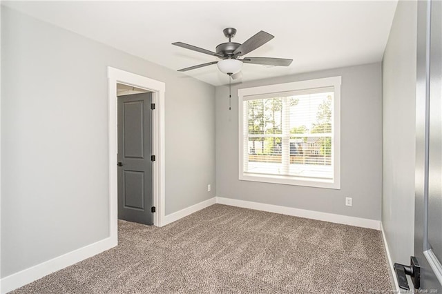 3029 Candlelight Dr, Fayetteville, NC 28311 - carpeted empty room with baseboards and a ceiling fan