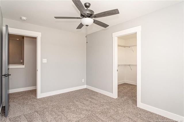 3029 Candlelight Dr, Fayetteville, NC 28311 - unfurnished bedroom with a spacious closet, carpet flooring, and baseboards