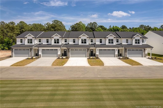 3029 Candlelight Dr, Fayetteville, NC 28311 - view of property featuring stone siding, concrete driveway, a front yard, and view of scattered trees