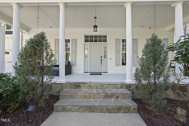 1006 Henny Pl, Raleigh, NC 27614 - view of exterior entry with a porch