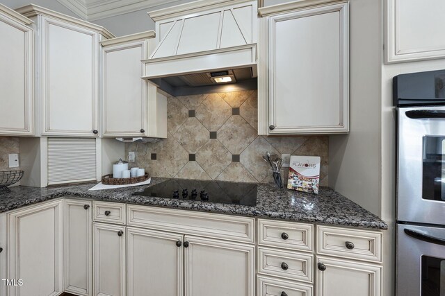 1006 Henny Pl, Raleigh, NC 27614 - kitchen featuring black electric cooktop, stainless steel double oven, backsplash, custom range hood, and dark stone counters